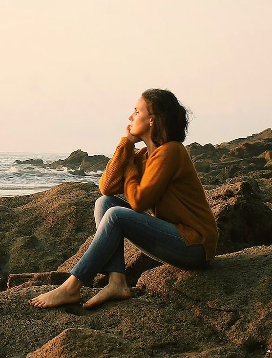 Woman Thinking on the Beach